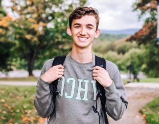 Male student wearing backpack